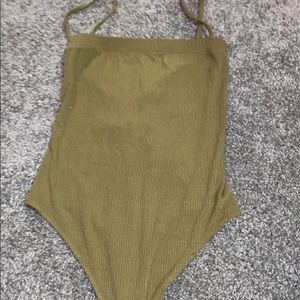 dark green body suit